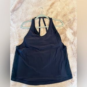 Black Lululemon tank with built in crisscross bra.